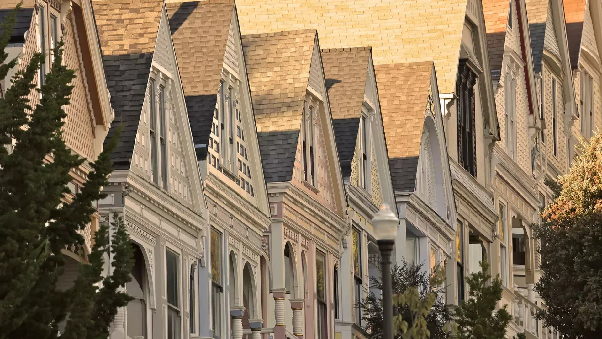 Close up of a row of Victorian houses in the Castro district of San Francisco.